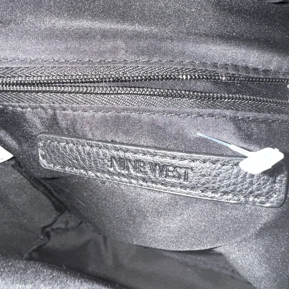 Chic & Compact: Nine West Taren Mini backpack Black logo canvas & leather